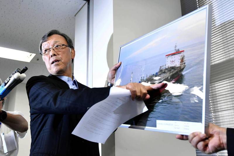 Yutaka Katada, president of shipping company Kokuka Sangyo Ltd. points to a picture of their tanker Kokuka Courageous, one of two that were hit in suspected attacks in the Gulf of Oman, during a news conference in Tokyo, Japan June 14, 2019, in this photo taken by Kyodo. Mandatory credit Kyodo/via REUTERS ATTENTION EDITORS - THIS IMAGE WAS PROVIDED BY A THIRD PARTY. MANDATORY CREDIT. JAPAN OUT. NO COMMERCIAL OR EDITORIAL SALES IN JAPAN.