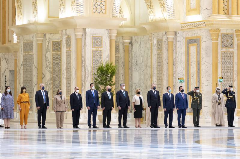 Members of the Greek delegation accompanying Mr Mitsotakis attend the official reception at Qasr Al Watan.