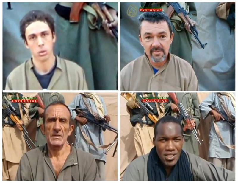 Four of six French hostages held by Al Qaeda in the Islamic Maghreb (AQIM) since September 2010, (LtoR) Pierre Legrand, Marc Feret, Daniel Larribe and Thierry Dole. Sahara Media via AFP



