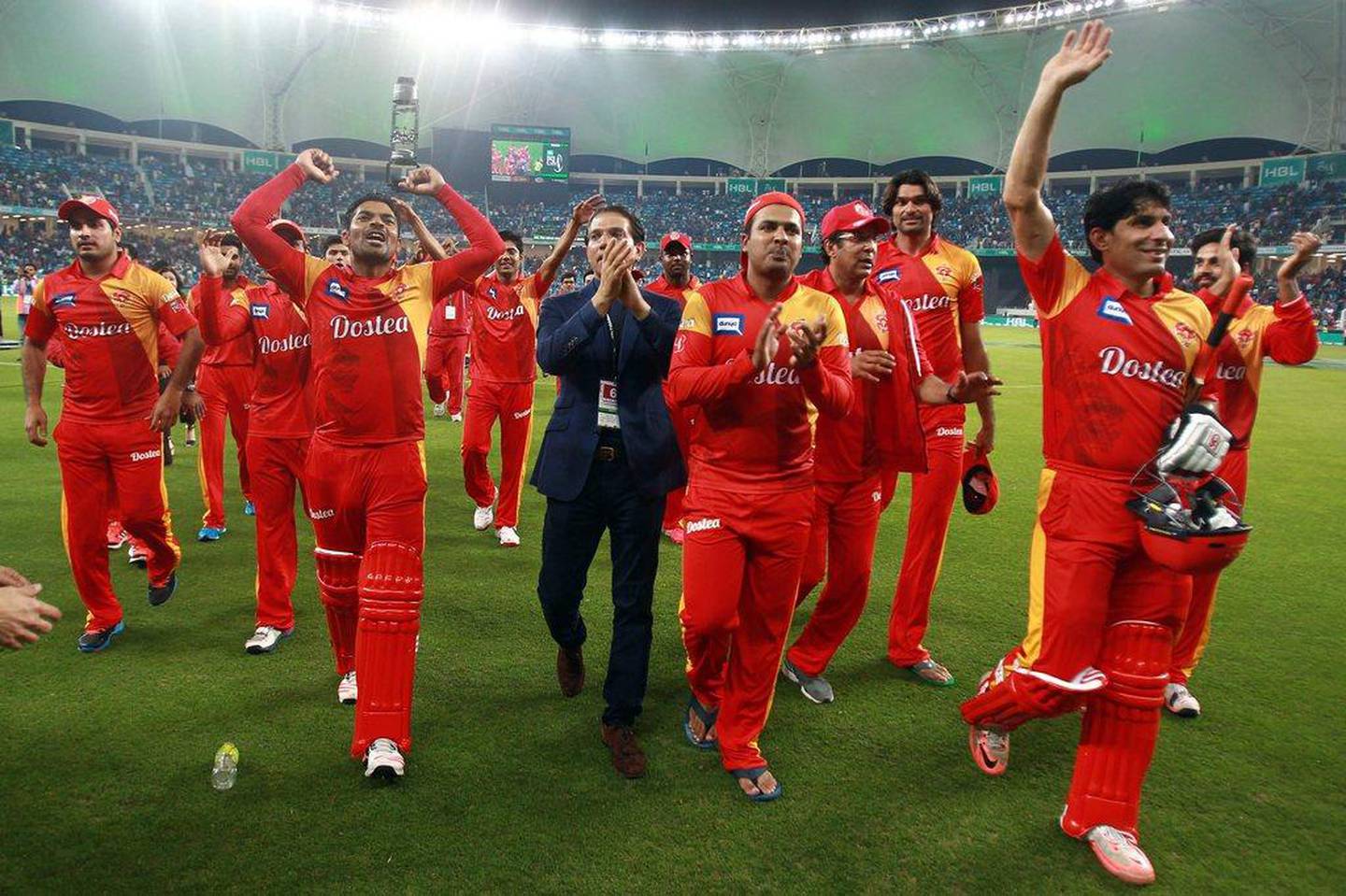 Players from the Islamabad United team celebrate winning the final of the Pakistan Super League against Quetta Gladiators at the Dubai cricket stadium on February 23, 2016. AFP