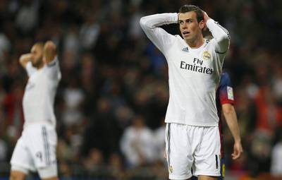 Real Madrid winger Gareth Bale reacts during the La Liga 'El Clasico' match between Real Madrid and FC Barcelona, on Sunday. Juanjo Martin / EPA / March 23, 2014