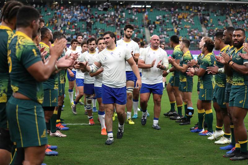 Uruguay players are applauded by Australia at the Oita Stadium. Getty