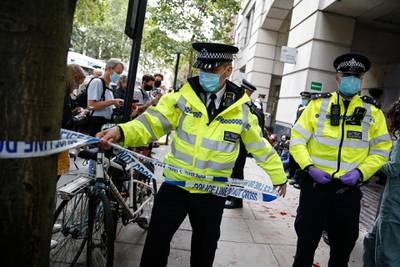 Police put tape up around the Department for Transport where Extinction Rebellion protesters were arrested. Getty