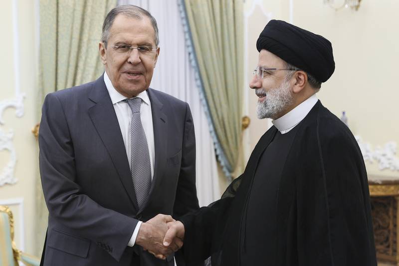 Russian Foreign Minister Sergey Lavrov, left, and Iranian President Ebrahim Raisi meet in Tehran last week. AP