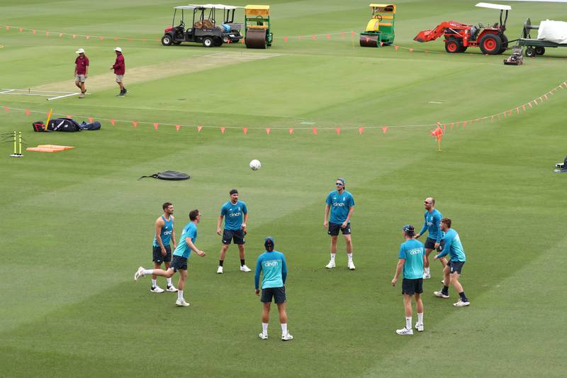England players play football during a training session at The Gabba, Brisbane. PA