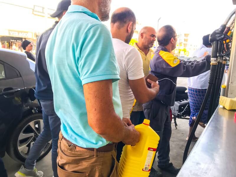 Rises in the cost of petrol and a shortage of basic goods have put some in Tunisia under increasing pressure. Ghaya Ben Mbarek for The National