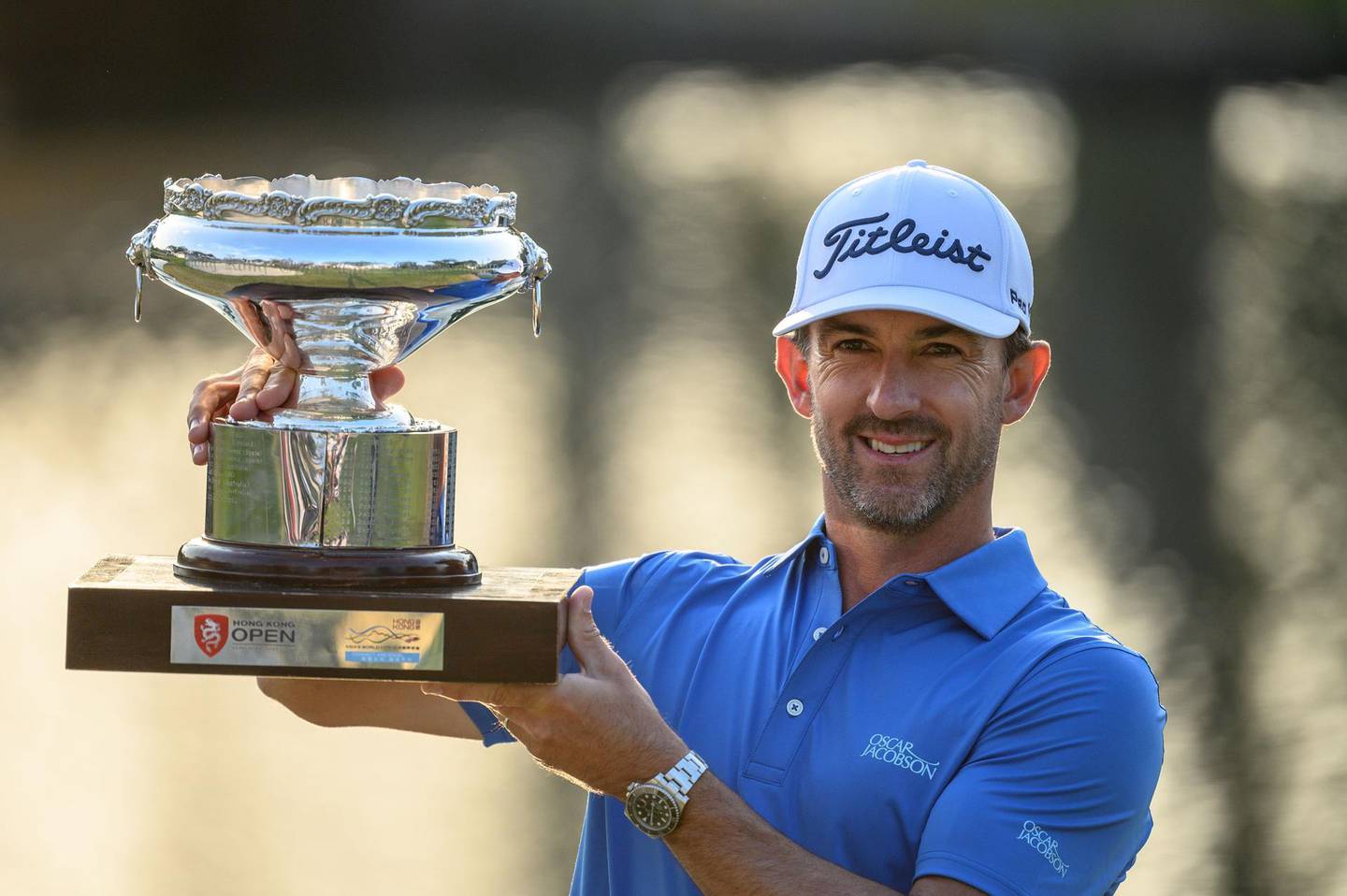 Australia's Wade Ormsby poses with the champion's trophy after winning in the final round of the Hong Kong Open golf tournament at the Hong Kong Golf Club on January 12, 2020. / AFP / Philip FONG
