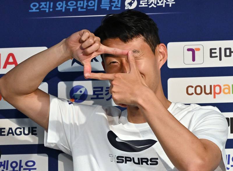 Tottenham Hotspur's South Korean striker Son Heung-min does his signature pose. AFP