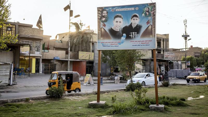 A poster of the brothers showing across the street from their house. Haider Husseini for The National