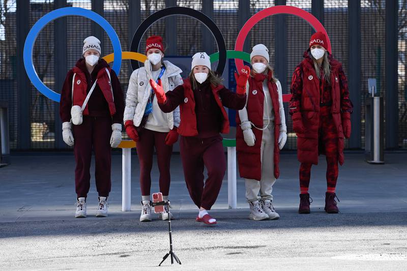 Members of Canada's team pose for a picture in Beijing 2022 Winter Olympic Games village. AFP