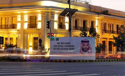 A billboard welcoming Mohammad Bin Salman on the eve of his visit, in Lahore. EPA