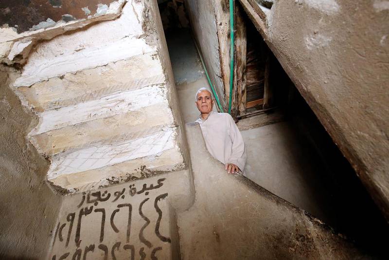 A man in Al Assal, one of the oldest slums in the Shubra district of Cairo. Amr Abdallah Dalsh/Reuters