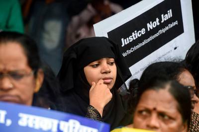 Women take part in a protest against the recent passage of a law to criminalise "instant divorce" for Muslims in Mumbai on August 1, 2019. The Indian government and women's groups hailed "historic" legislation July 31 that criminalised "instant divorce" for Muslims, but an influential Islamic group said it would launch a legal challenge.
 / AFP / PUNIT PARANJPE                      
