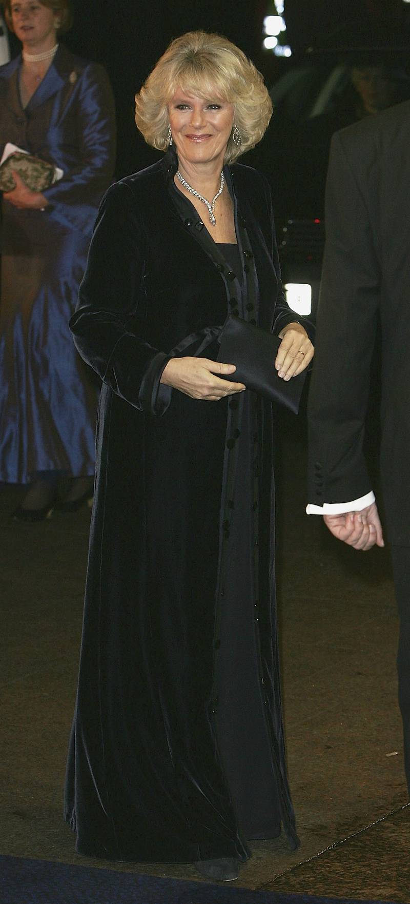 Camilla Parker Bowles, in a black dress and velvet coat, at the UK film premiere of 'Merchant Of Venice' in London on November 29, 2004. Getty Images
