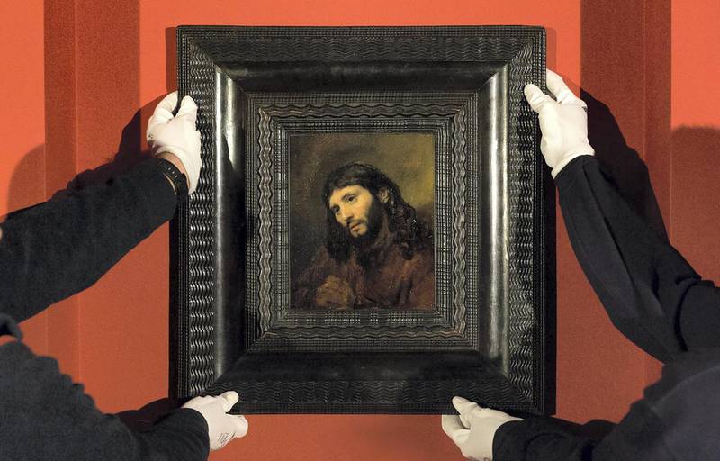 Rembrandt's 'The Head of a Young Man in Prayer' being uncrated at Louvre Abu Dhabi. Courtesy Louvre Abu Dhabi.  