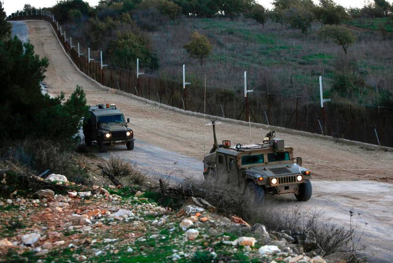 Israeli military vehicles near the kibbutz Manara in northern Israel's upper Galilee patrol along the border with Lebanon overlooking the Hula Valley. AFP