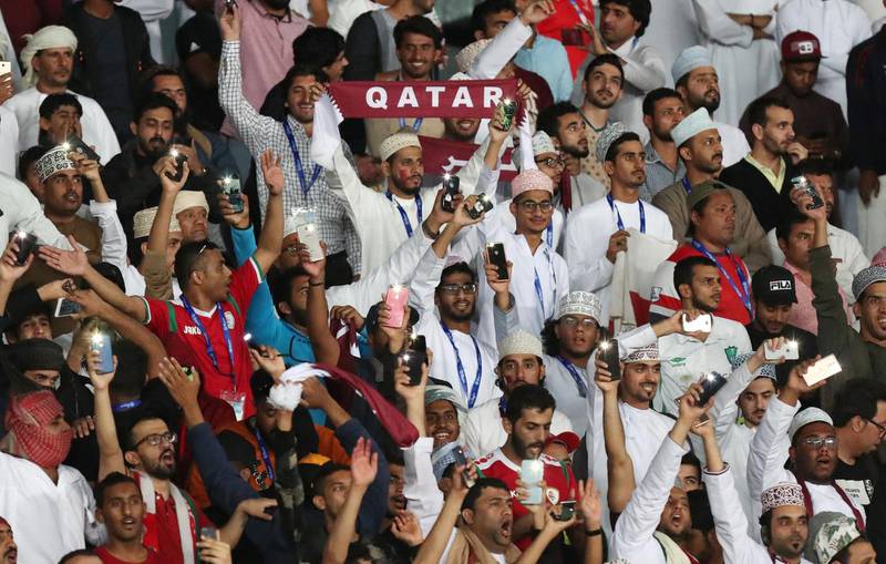 Qatar fans celebrate their third goal during the final against Japan. Suhaib Salem / Reuters