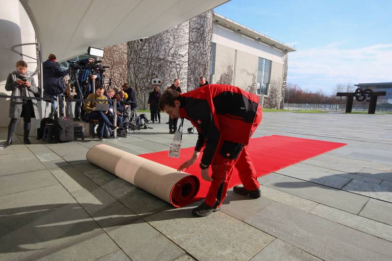 A red carpet is unrolled at the Chancellery. Reuters