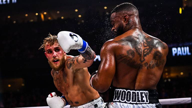 An image that illustrates this article Jake Paul KOs Tyron Woodley rematch with vicious punch - in pictures