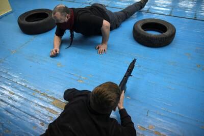 Ukrainian civilians who volunteered to join the Territorial Defence Forces take part in a training exercise in Odesa after Russia's invasion. Reuters