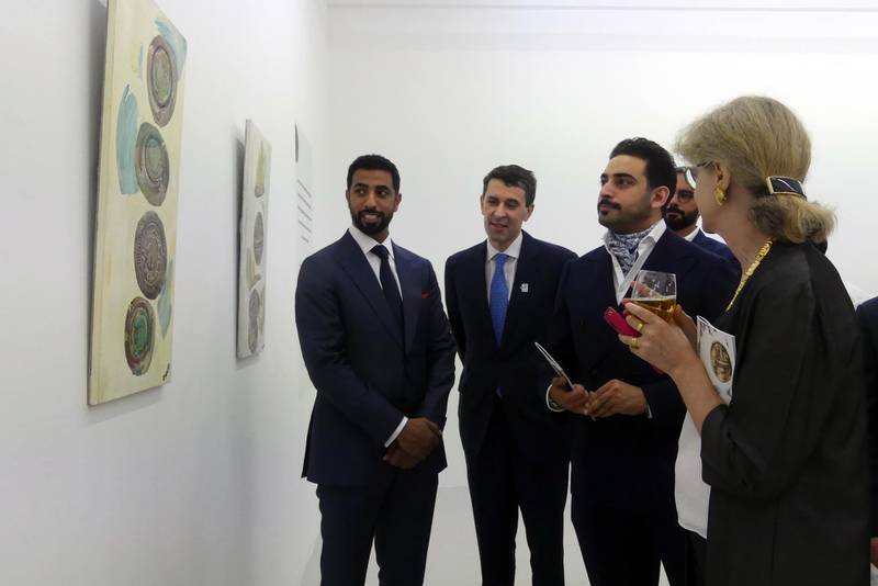 Sheikh Mohammed bin Nahyan Al Nahyan, the UAE's ambassador to the UK, Mansoor Abulhoul, Sheikh Zayed bin Sultan Al Nahyan and curator Janet Rady attend the opening of the exhibition at Pi Artworks. Jonathan Milton