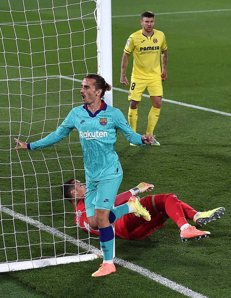 Antoine Griezmann clebrates after his side's first goal, an own goal scored by Pau Francisco of Villarreal. Getty