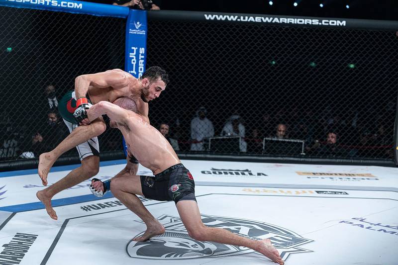Canadian Jesse Arnett on the attack against Algerian Elias Boudegzdame in the Catchweight 64kg in the UAE Warriors 15 at the Jiu-Jitsu Arena on Friday, January 15, 2021. Courtesy UAE Warriors