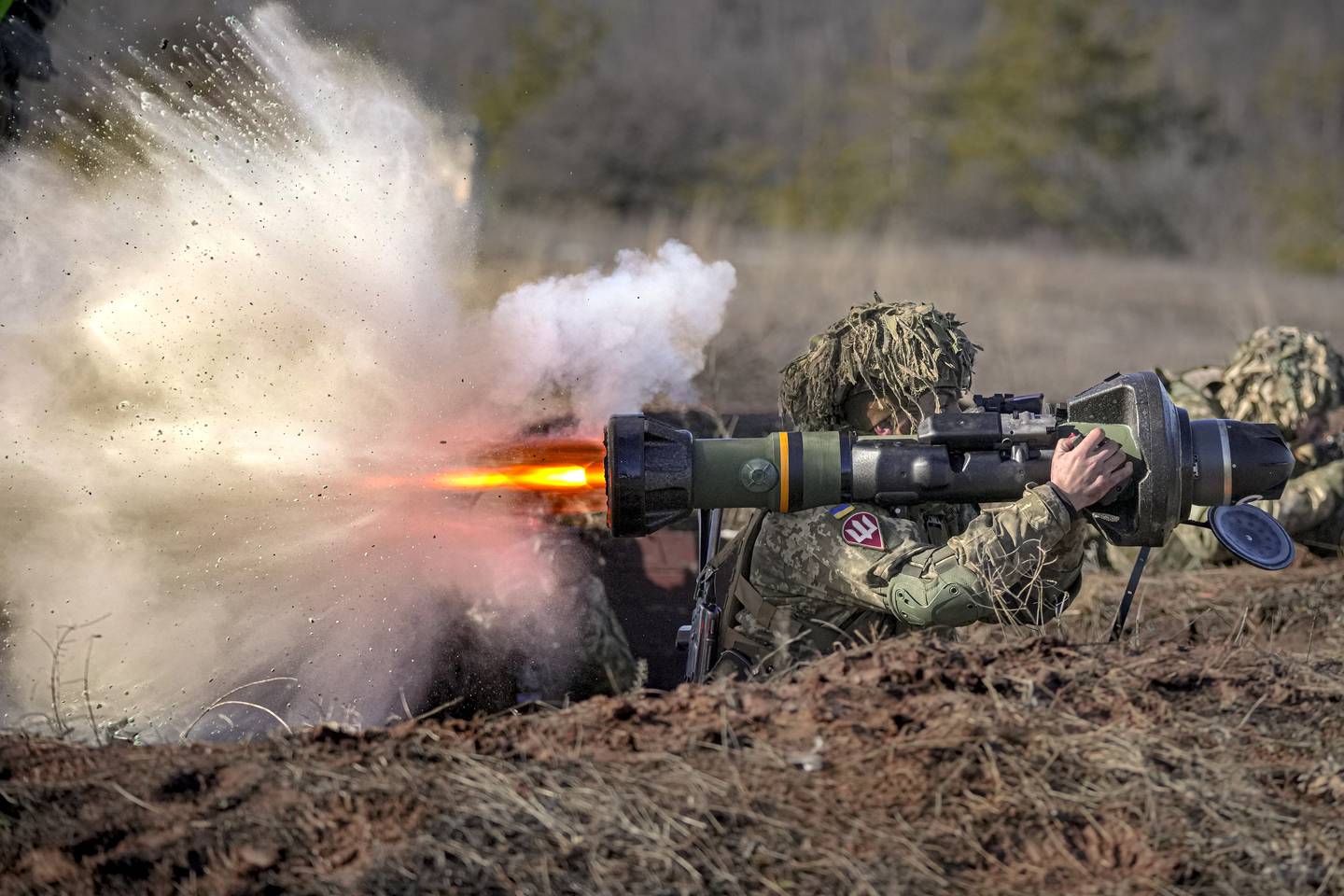 A Ukrainian serviceman fires an NLAW anti-tank weapon during an exercise in the Joint Forces Operation, in the Donetsk region, eastern Ukraine, Tuesday, Feb.  15, 2022.  While the U. S.  warns that Russia could invade Ukraine any day, the drumbeat of war is all but unheard in Moscow, where pundits and ordinary people alike don't expect President Vladimir Putin to launch an attack on its ex-Soviet neighbor.  (AP Photo / Vadim Ghirda)