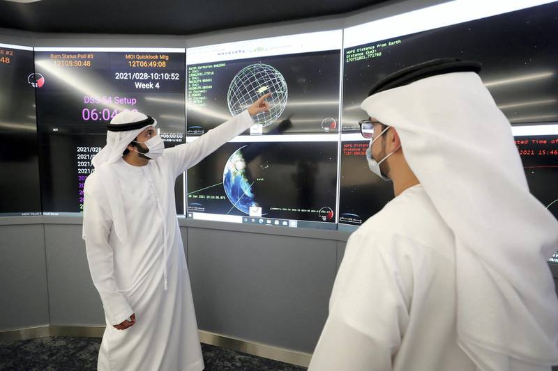 Dubai, United Arab Emirates - Reporter: Sarwat Nasir. News. Space. Mahmood Abdulaziz AlNasser (R), Mission Operations Control Development Lead speaks with Khalid Mohammad Badri, Instrument Science engineer in mission control. Visit to MBRSC ground station for upcoming Mars orbit insertion. Dubai. Thursday, January 28th, 2021. Chris Whiteoak / The National