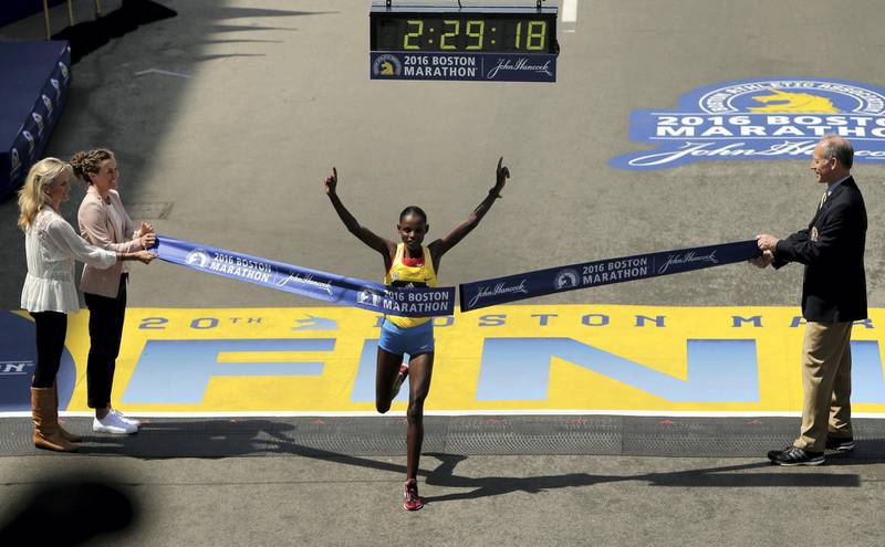 BOSTON, MA - APRIL 18: Atsede Baysa of Ethiopa crosses the finish line to win the 120th Boston Marathon on April 18, 2016 in Boston, Massachusetts.   Mike Lawrie/Getty Images/AFP