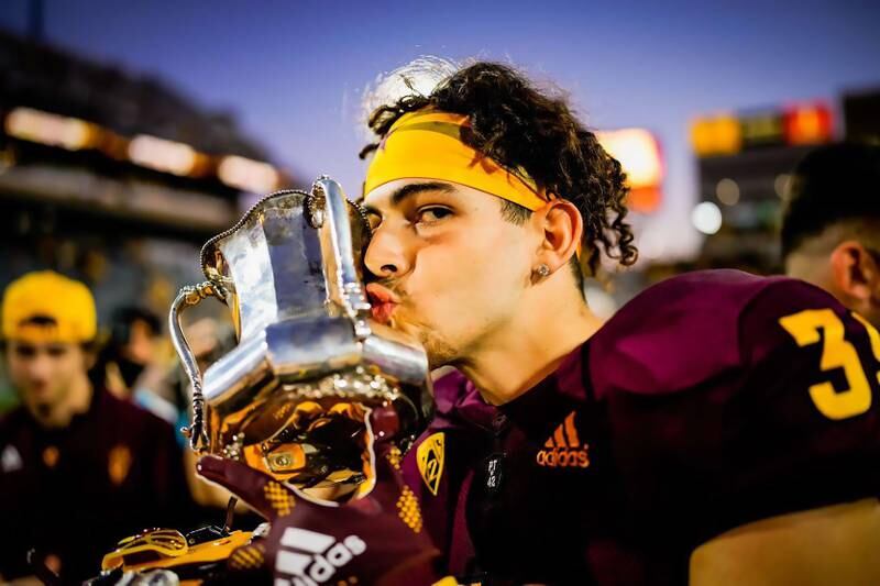 Adam Babb with the Territorial Cup after Arizona University retained the title for the fifth time.  Sundevil Athletics