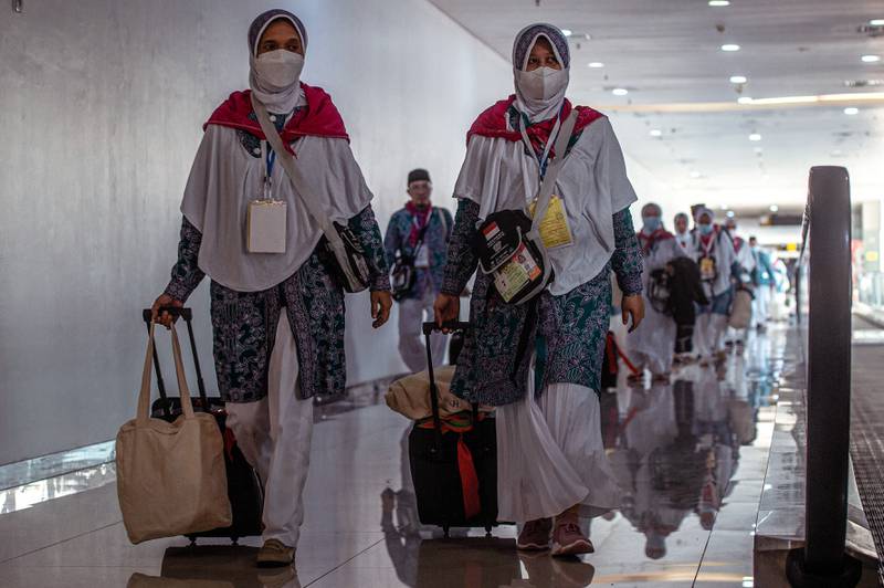 Indonesian pilgrims prepare to depart from Juanda International Airport in Surabaya, to perform Hajj in Makkah, Saudi Arabia.  All photos: AFP