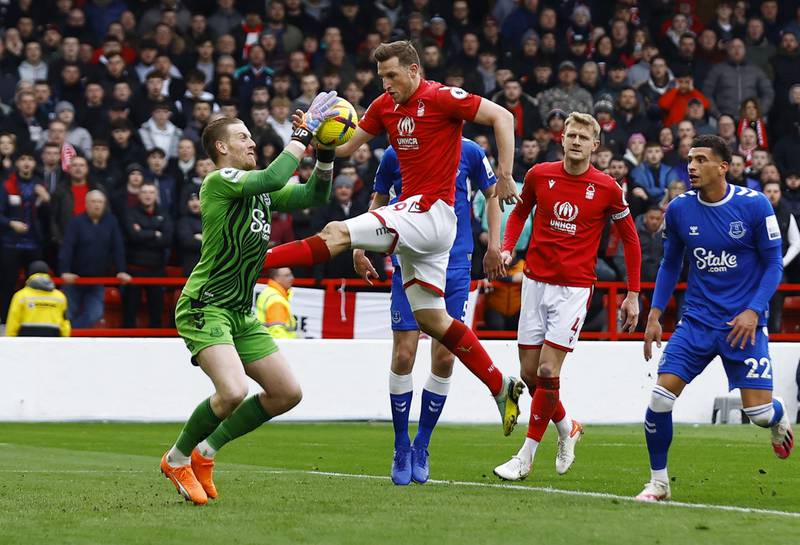 Everton's Jordan Pickford saves from Nottingham Forest's Chris Wood. Reuters