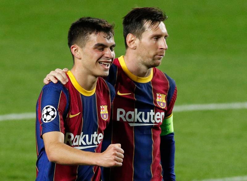 Barcelona's Pedri celebrates scoring their fourth goal with Lionel Messi. Reuters