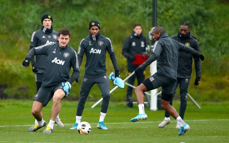 Harry Maguire (left) and Marcus Rashford during the training session before the game against Partizan Belgrade. PA