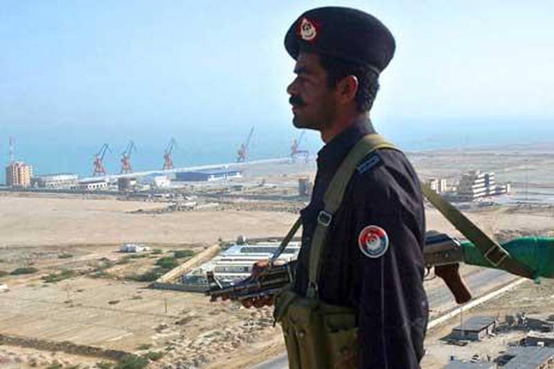 In this picture taken in 2007, a Pakistan security guard stands near the the Beijing-funded 'megaport' of Gwadar in southwestern Pakistan. AFP Photo