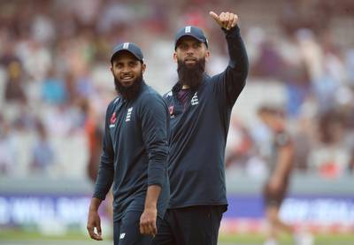 England's Adil Rashid and Moeen Ali before the match. Reuters