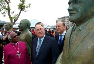 Desmond Tutu and former South African president FW de Klerk during the unveiling of statues of South Africa's four Nobel Peace Prize winners: de Klerk, Tutu, Chief Albert Luthuli, former president of the African National Congress, and former president Nelson Mandela. AFP