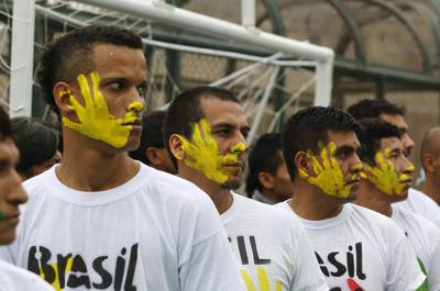 Prisoners participate in the opening ceremony of their own Prison World Cup at the Castro-Castro prison in Lima, Peru, on Monday. Mariana Bazo / Reuters / June 2, 2014