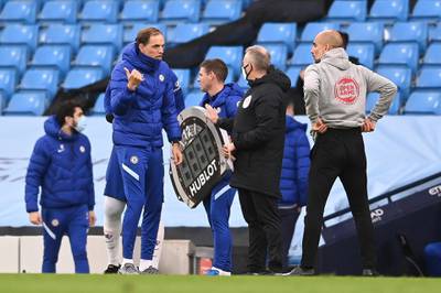 Chelsea manager Thomas Tuchel argues with the fourth official. EPA