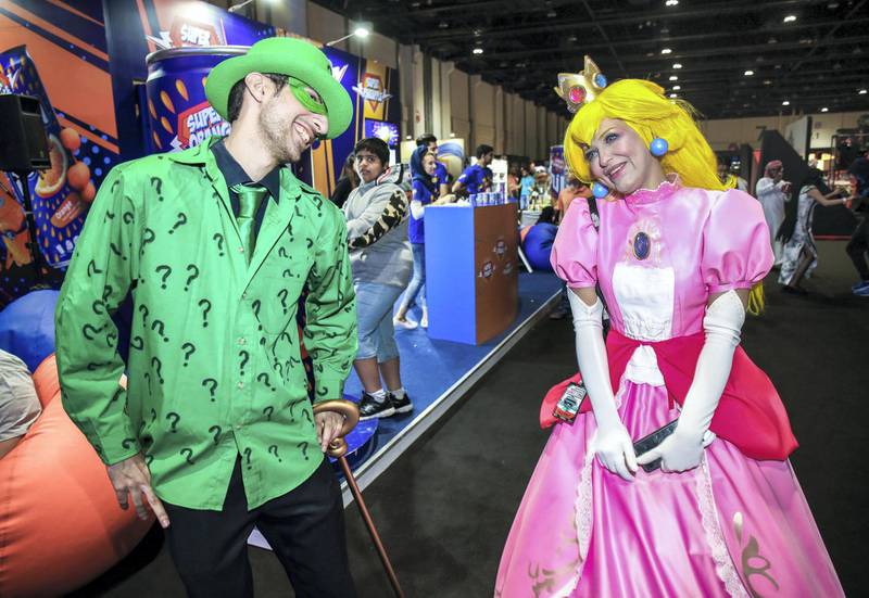 November 24, 2017. The Riddler and Princess Peach strike a pose during the Games Con Middle East at ADNEC.Victor Besa for The NationalACRequested by: Clare Dight