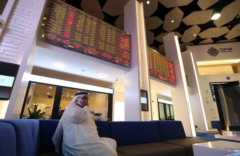 epa07025683 Traders gather at the stock exchange at the Dubai Financial Market, in Dubai, United Arab Emirates, 16 September 2018. Dubai Financial Market General Index (DFMGI) dropped by 1.27 percent.  EPA/ALI HAIDER