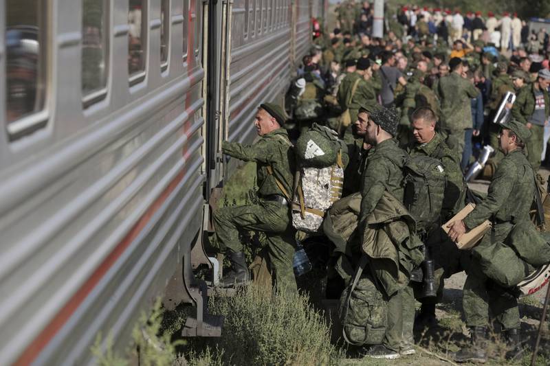 Russian recruits board the train to Ukraine in Volgograd. AP