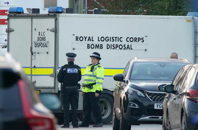 Police next to a bomb investigation unit lorry at the Liverpool Women's Hospital in England after the explosion on Sunday. Counter-terrorism police are investigating an explosion that killed one person and injured another. Peter Byrne / PA