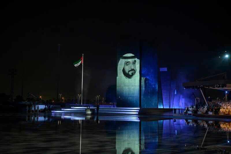 An image of the President Sheikh Khalifa projected on to the monument at Wahat Al Karama. 