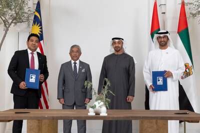 President Sheikh Mohamed and Sultan Abdullah stand with Mr Tengku Taufik and Dr Al Jaber
