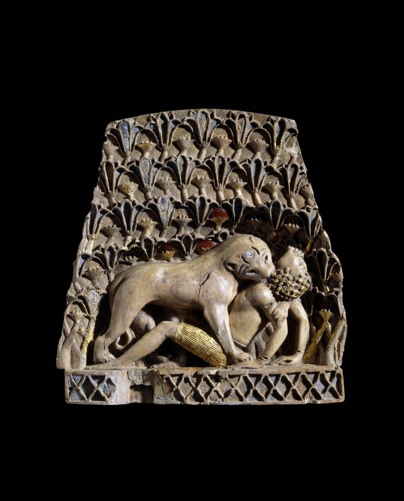 Ivory plaque of a lioness mauling a man, ivory, gold, cornelian, lapis lazuli, Nimrud, 900BC – 700BC © The Trustees of the British Museum