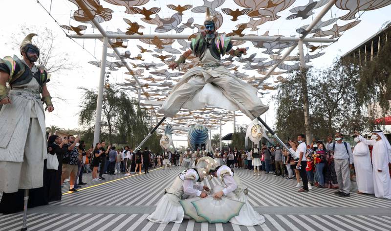 Visitors attend the closing ceremony of Expo 2020, in Dubai on March 31. AFP