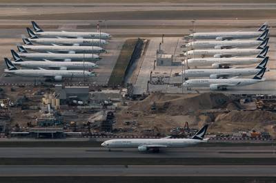 Cathay Pacific aircraft are seen parked on the tarmac at the airport, following the outbreak of the new coronavirus, in Hong Kong. Reuters