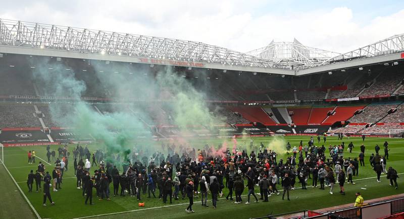 Manchester United supporters stormed Old Trafford before the game against Liverpool on Sunday, May 2. The game had to be postponed as a result of the protests against United's American owners. AFP